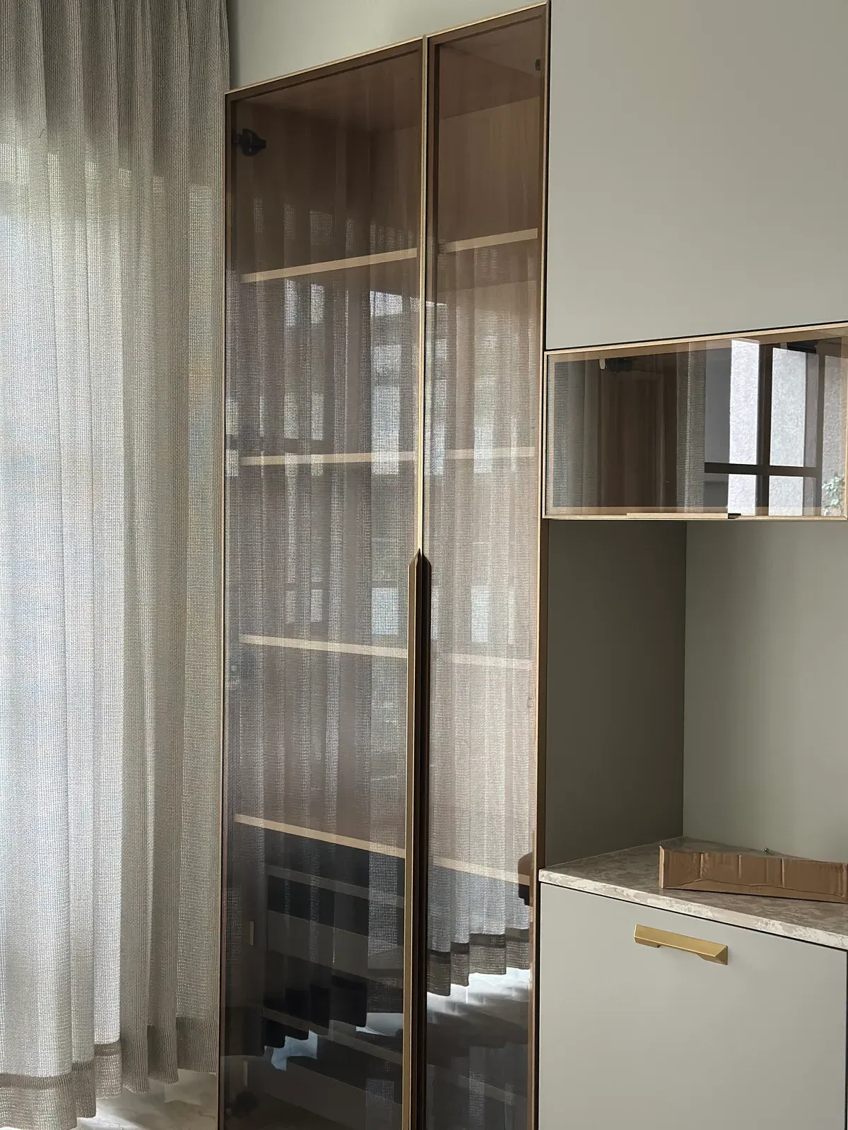 Crockery unit with fluted glass shutters — Seema Katta Crockery